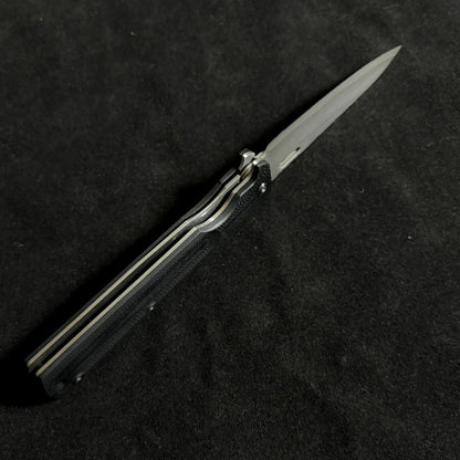 Japanese-origin Takeshi Saji Folding Knife: Damascus SG2 Powdered Steel, Handcrafted, G10 Handle.